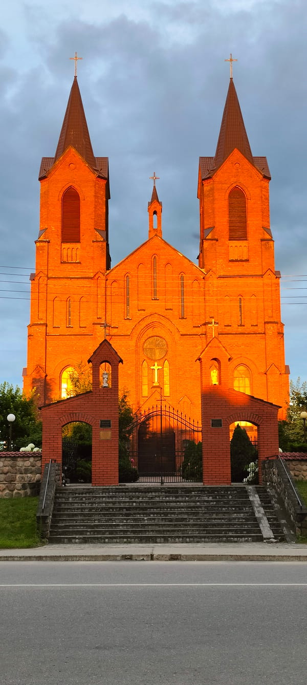 Sunset illuminates historic church in Myory, Belarus