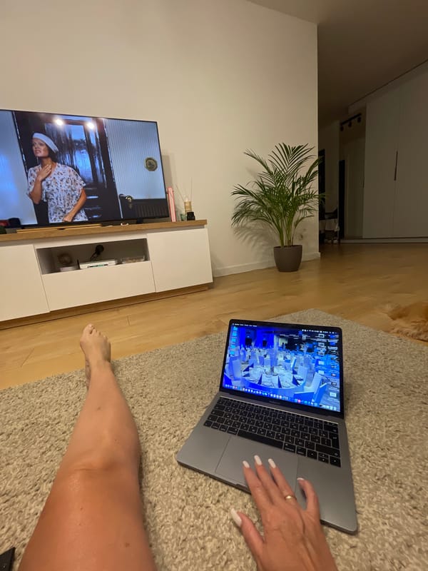 Cozy home evening in Wrocław with a dog, candles, and a virtual event