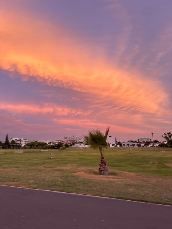 Colorful sunset observed over Blouberg grassland, South Africa