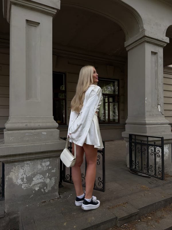 Woman poses for photos at historic Kazan building