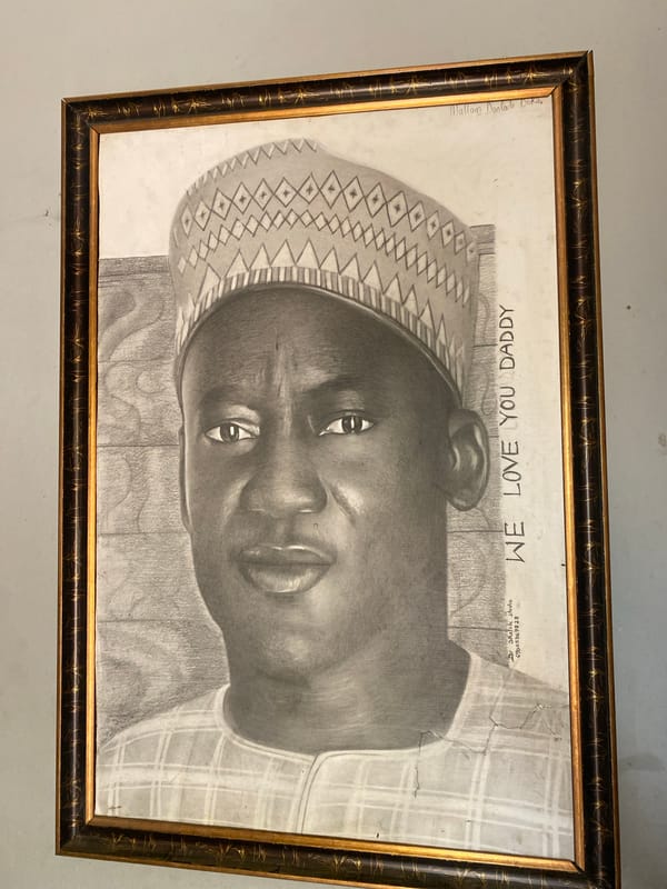 Portrait artworks displayed in Barakin Akawo, Nigeria