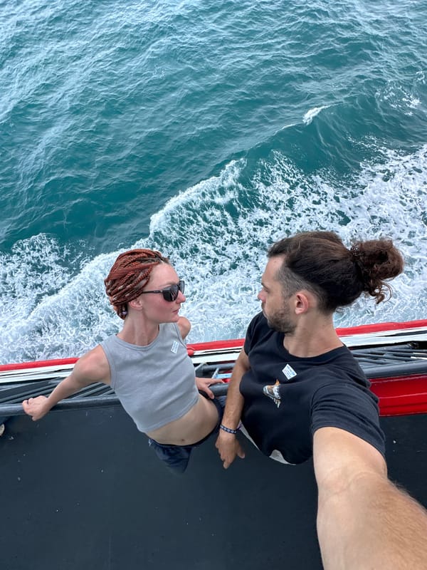 Ferry deck moments on turquoise waters off Nathon, Thailand