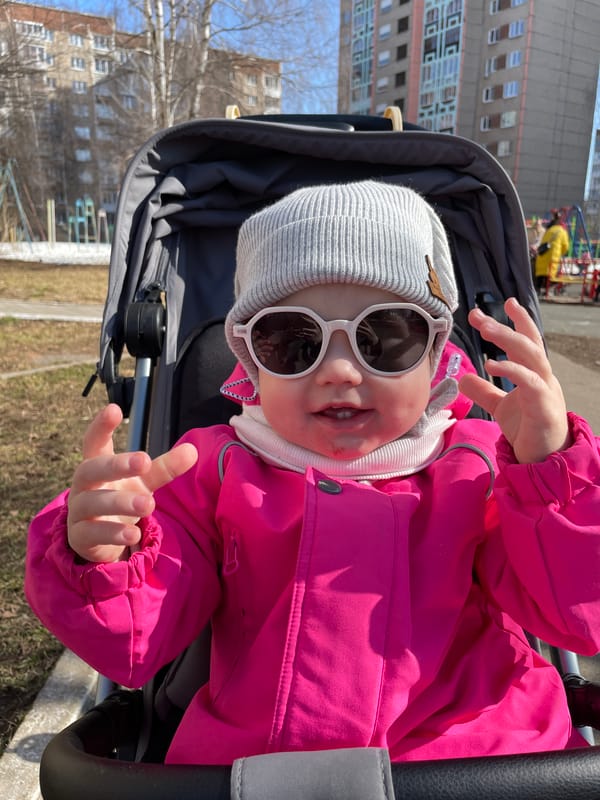 Mother and child enjoy outdoor moment in Izhevsk park