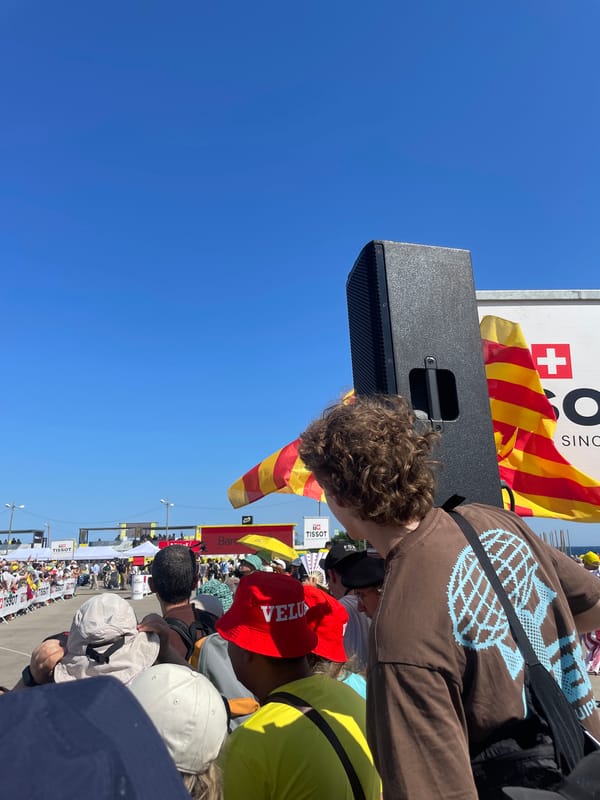 Pro cycling race rolls through Barcelona to roadside crowds