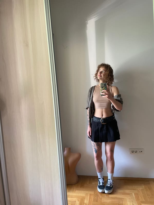 Person takes mirror selfie in Boreti, Montenegro