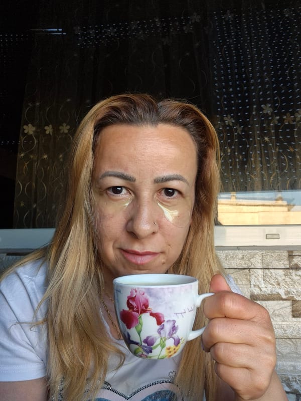 Floral mug with frothy drink in various indoor outdoor settings