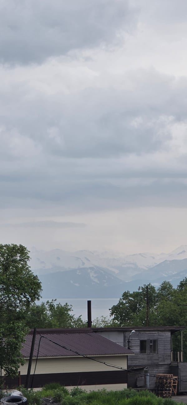 Overcast morning in Petropavlovsk-Kamchatsky, rain and a parked 4x4