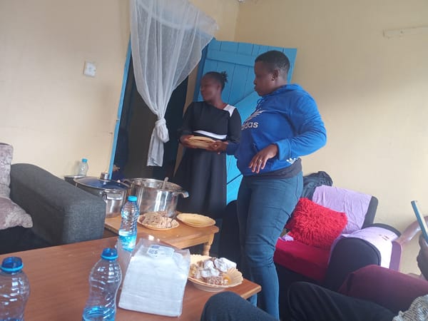 Community meal gathering documented in Matulo ward, Kenya