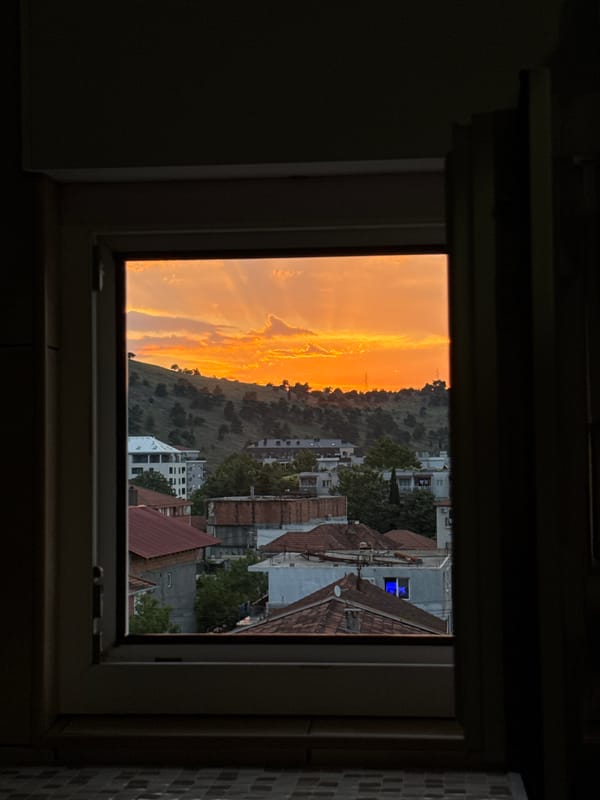 Dramatic sunset illuminates Podgorica sky with vibrant colors