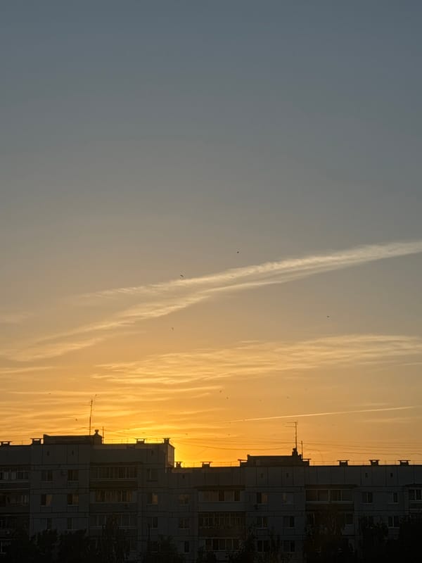 Urban sunset documented by witnesses across city district