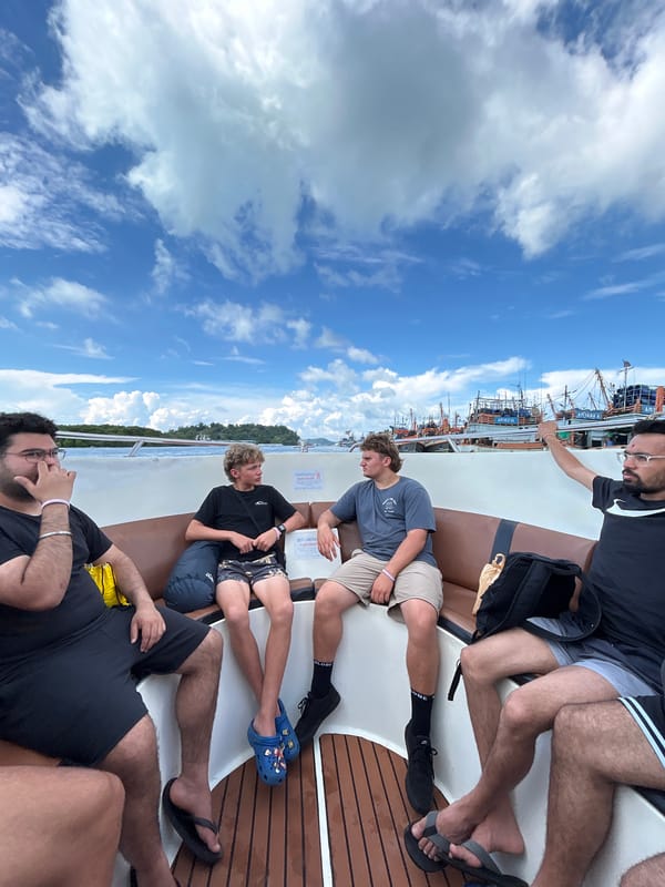 Boat trip through Ratsada waters on cloudy day