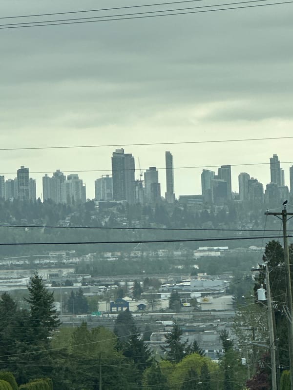 Evening cityscape views captured in Coquitlam under overcast skies