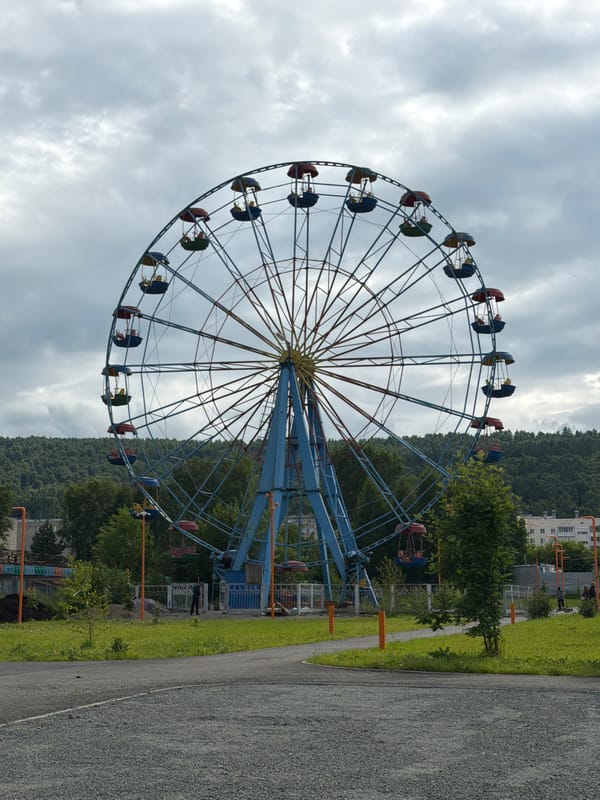 Amusement park day: Ferris wheel rides, scooters, and selfies