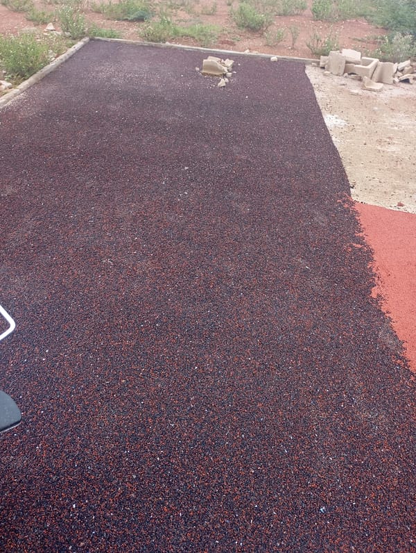 New rubberized track surface going in at Jos stadium