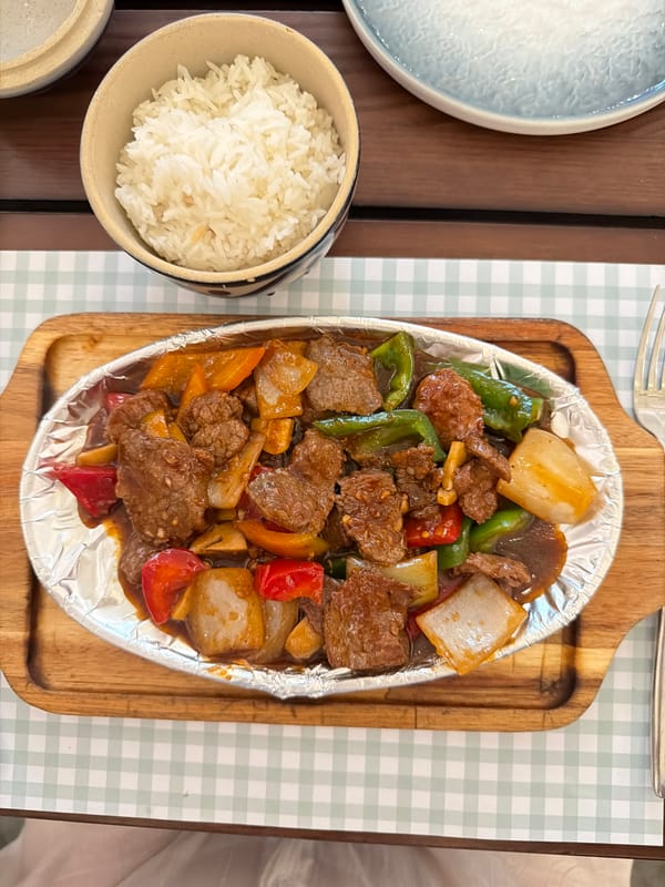 Stir-fried meal documented at Nha Trang dining table
