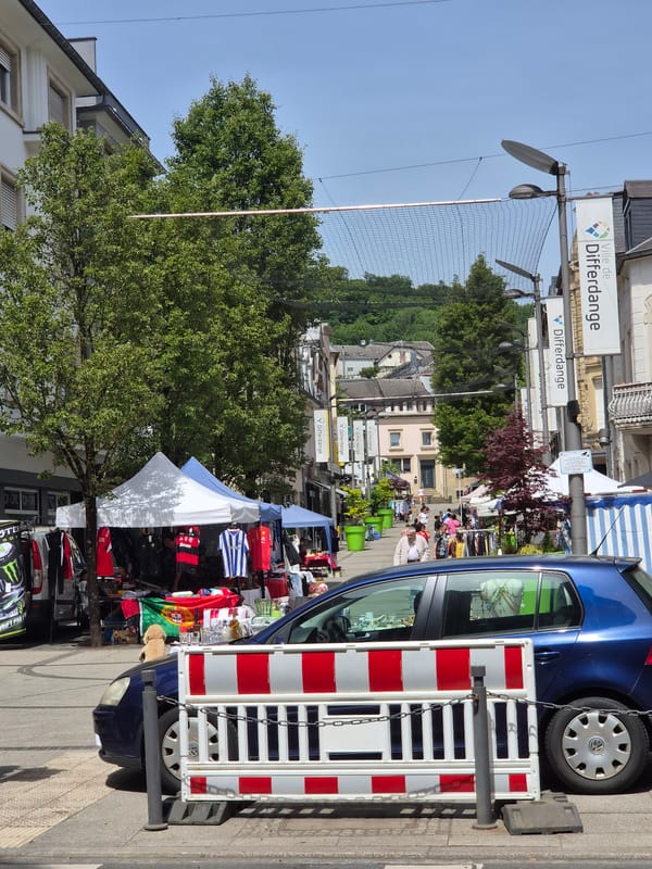 Daily life documented across Differdange, Luxembourg street scenes