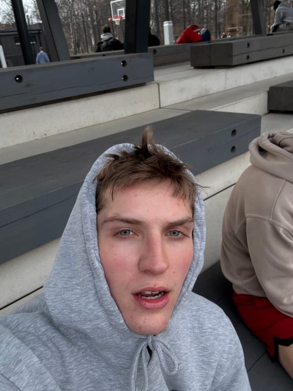 People gather at basketball court in Riga