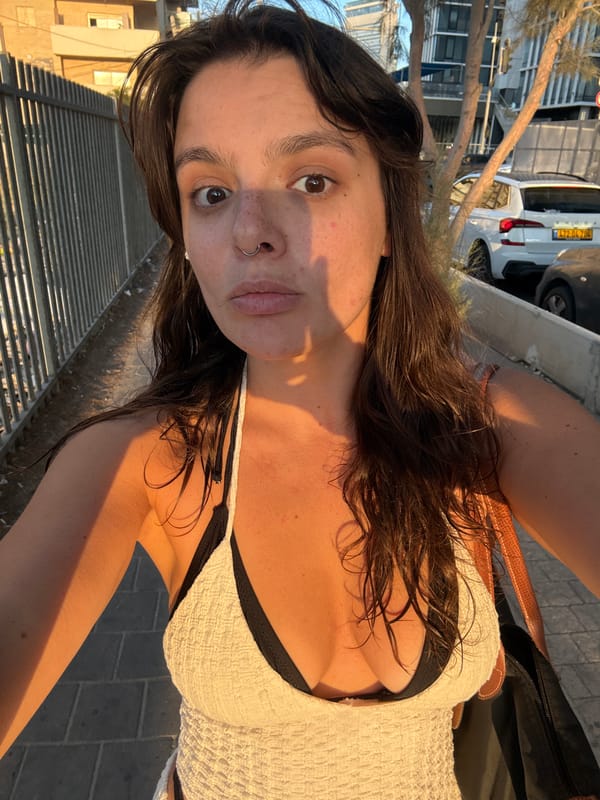 Tel Aviv promenade at golden hour, selfie and skyline