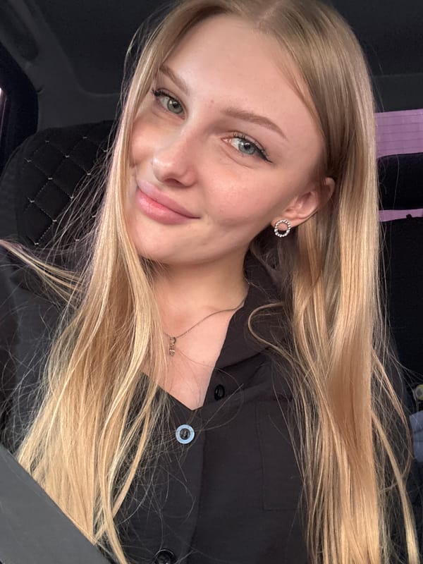 Woman photographed smiling in Кондратово, Russia
