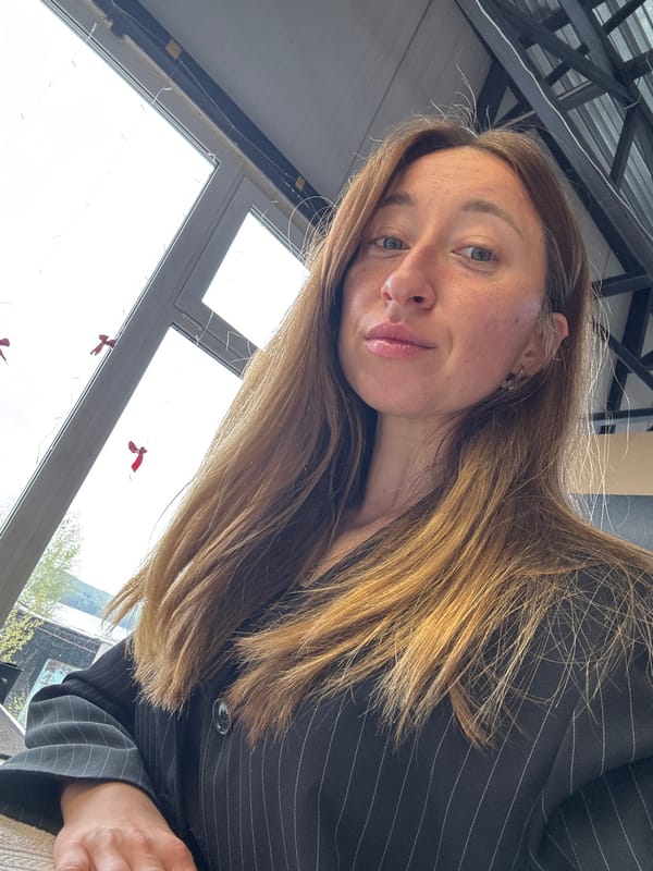 Woman poses for photos in office in Chaikovsky, Russia