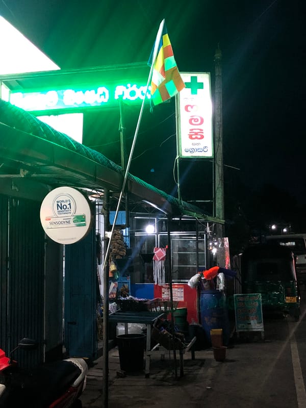 Nighttime commercial scenes captured in two Sri Lankan towns