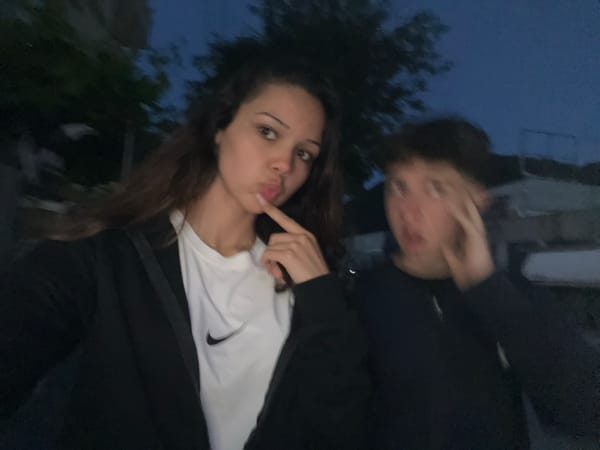 Young Couple Takes Evening Selfies on Zlatograd Street
