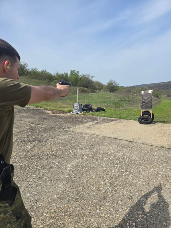 Man practices at outdoor shooting range in Beliakovets, Bulgaria