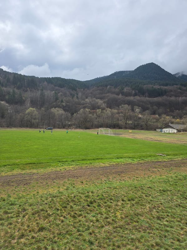 Soccer field captured amid mountain landscape in Devin, Bulgaria