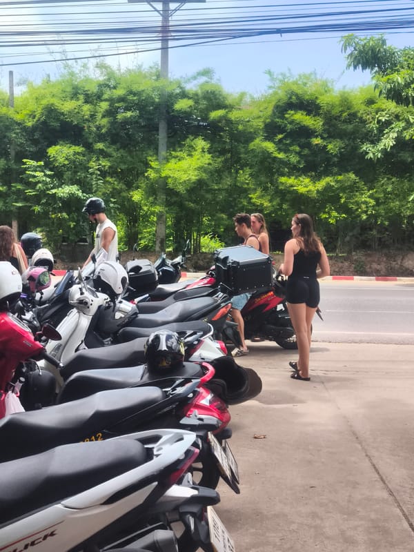 Coffee and pastries at a cafe, motorcycles parked nearby outside