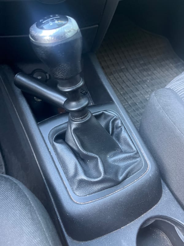 Driver documents car interior and baby during Bulgaria stop