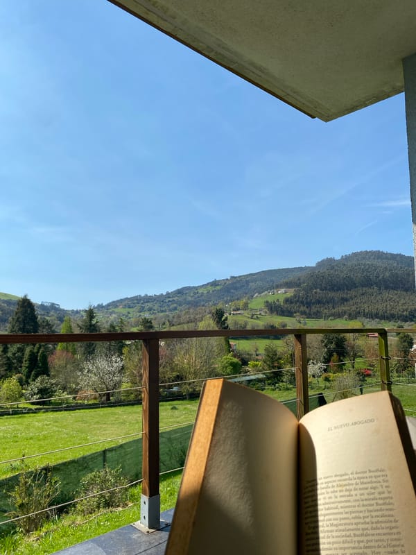 Quiet Saturday morning documented on residential balcony in Villaviciosa