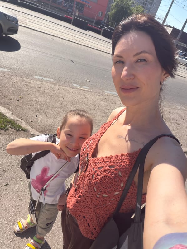 Woman and child pose for selfie in Perm, Russia