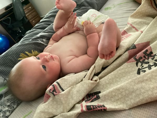 Baby on a bed, various angles and positions
