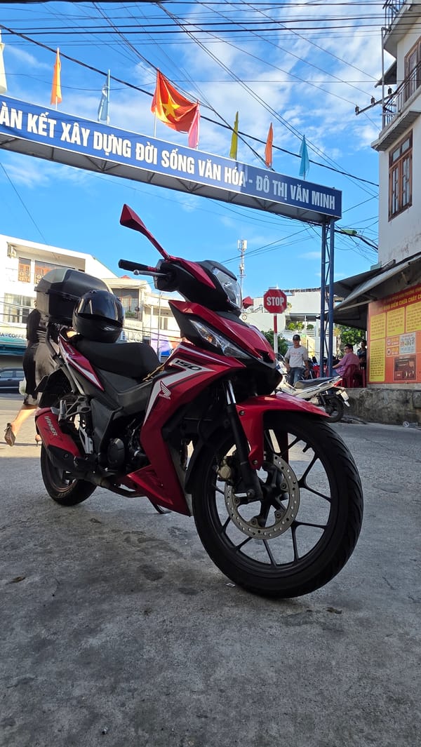 Nha Trang street scenes: motorcycles, overhead wires, and midday life