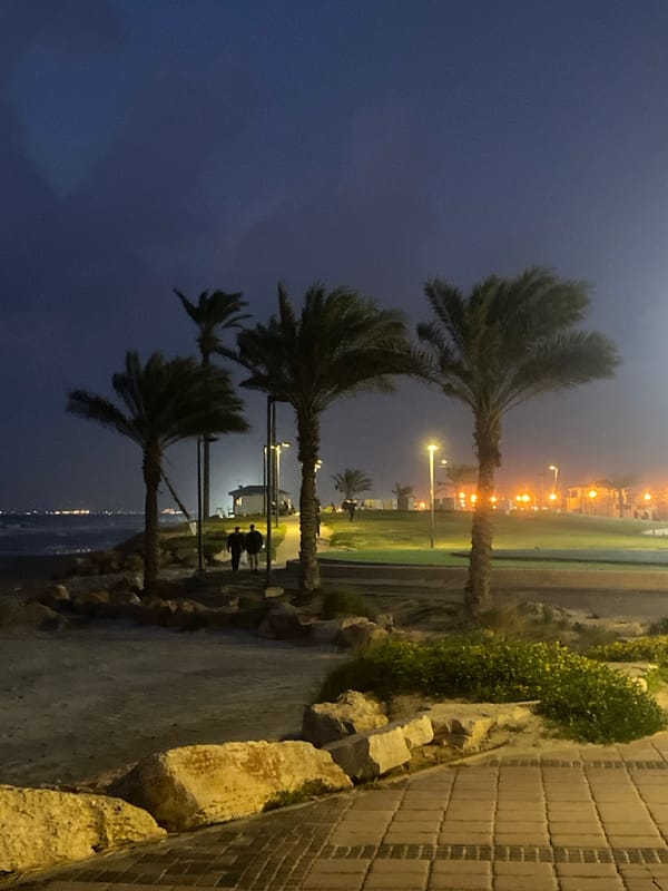 Families enjoy afternoon beach time in Kiryat Yam, Israel