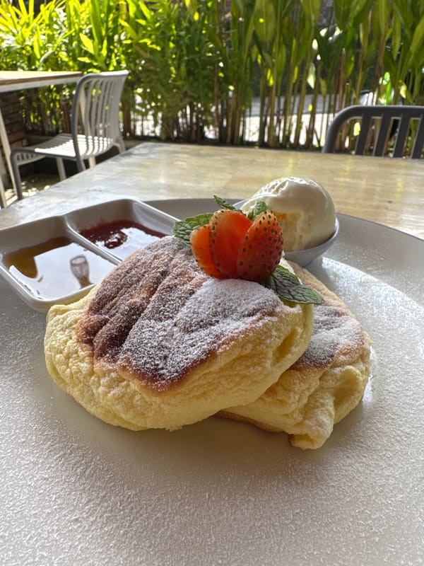Morning moments captured in Kediri: pancakes, dog, coffee