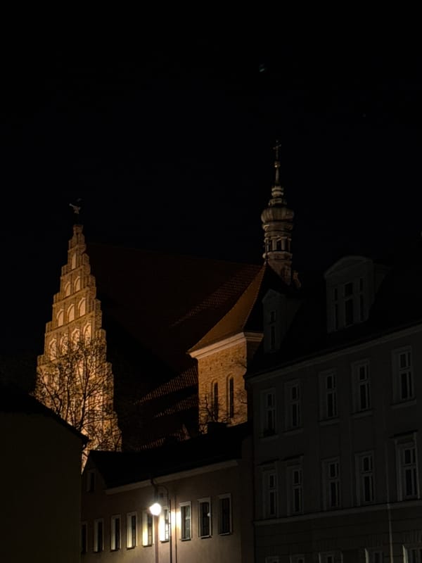 Nighttime photography documents illuminated landmarks in Bydgoszcz, Poland