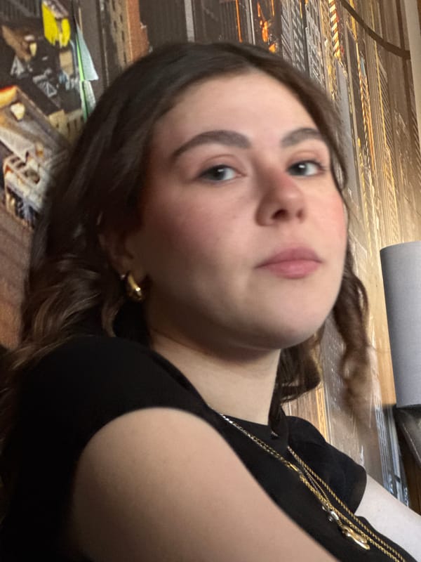 Woman takes indoor selfies in Mirandela home setting