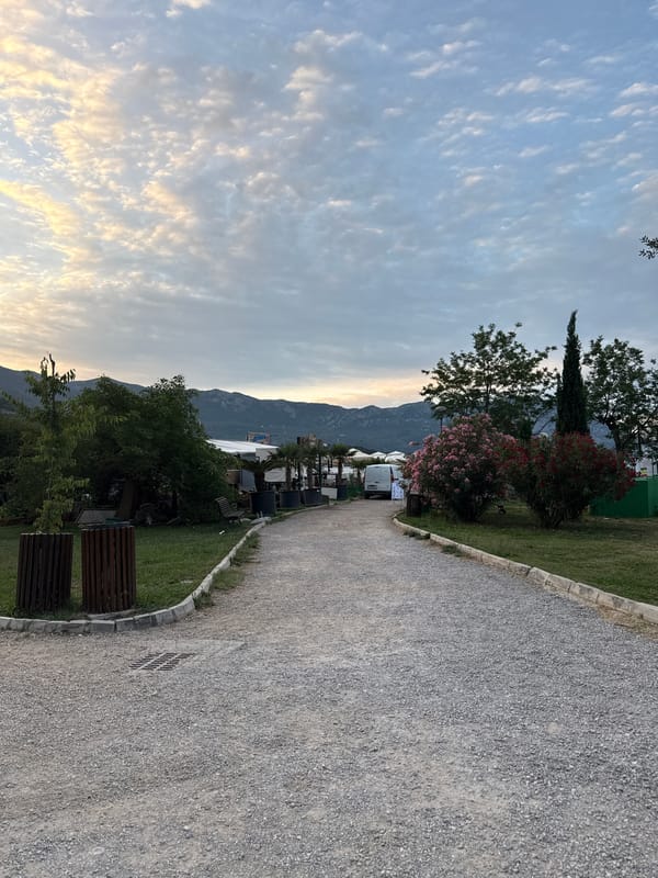 Evening street scenes across Budva's waterfront and construction zones