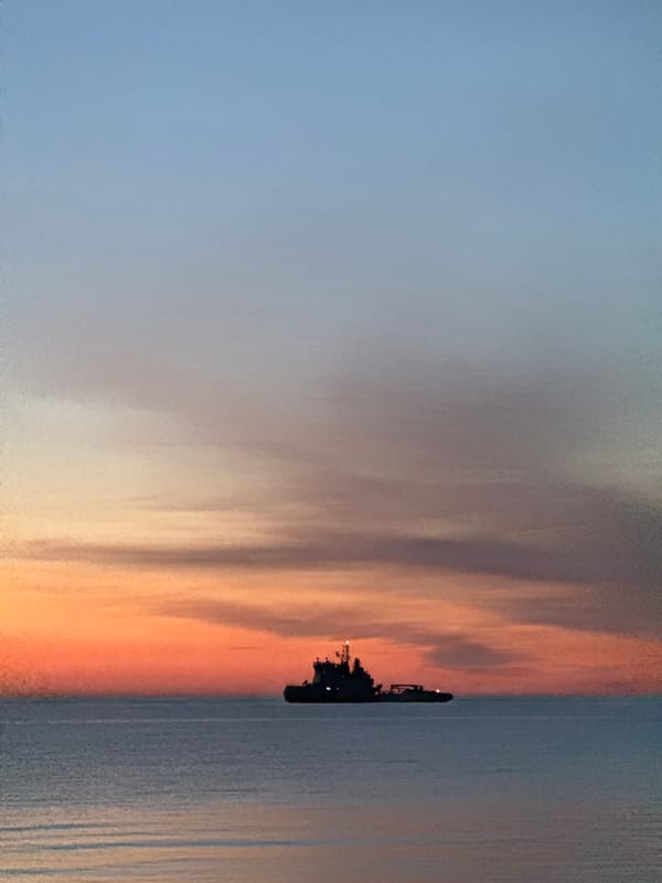 Tallinn waterfront sunset documented over Baltic Sea and marina