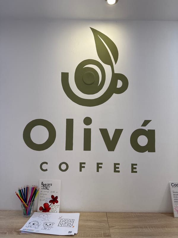 Tourist documents spring morning coffee shop visit in Budva
