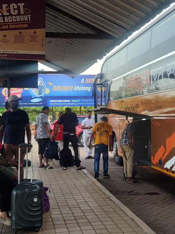 Routine afternoon bus operations observed at Mapusa transit terminal
