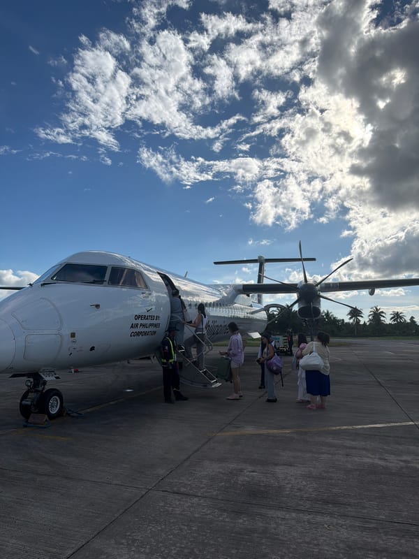 Morning flight boarding observed at Del Carmen airport terminal
