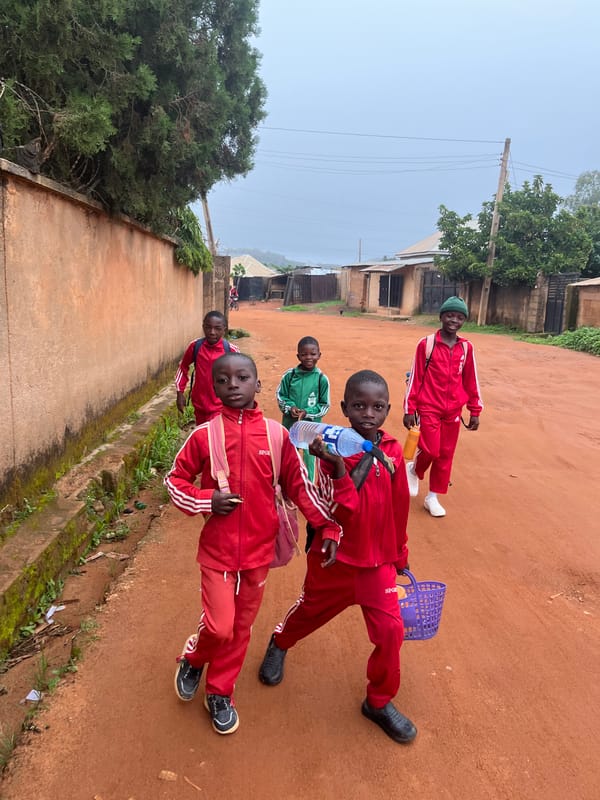 School morning on the dirt roads of Jos, Nigeria