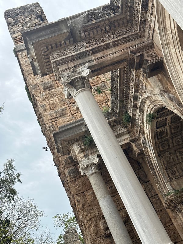 Tourist explores historic Antalya landmarks and local culture