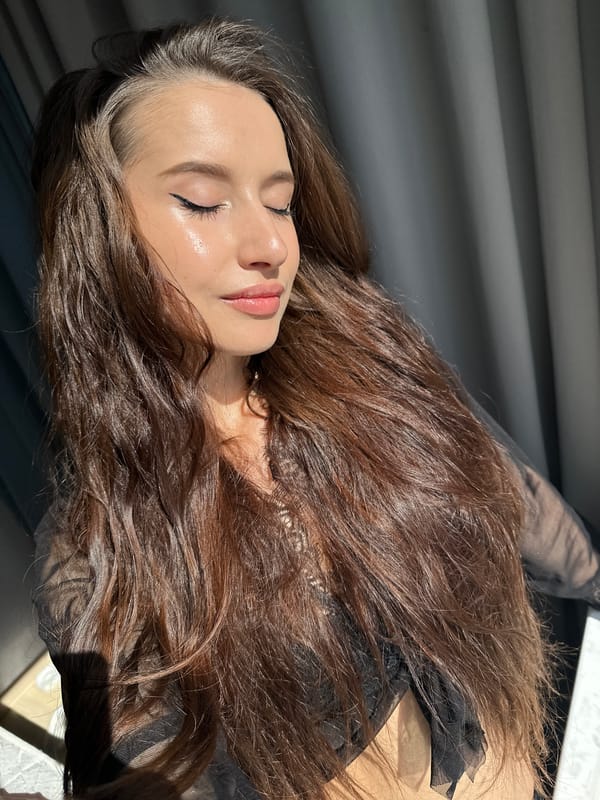 Woman photographs herself in multiple indoor portraits, Yekaterinburg