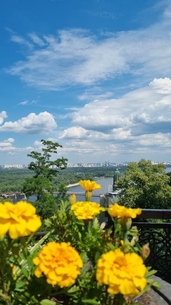 Piano plays at Kyiv's Dnipro overlook on a sunny afternoon