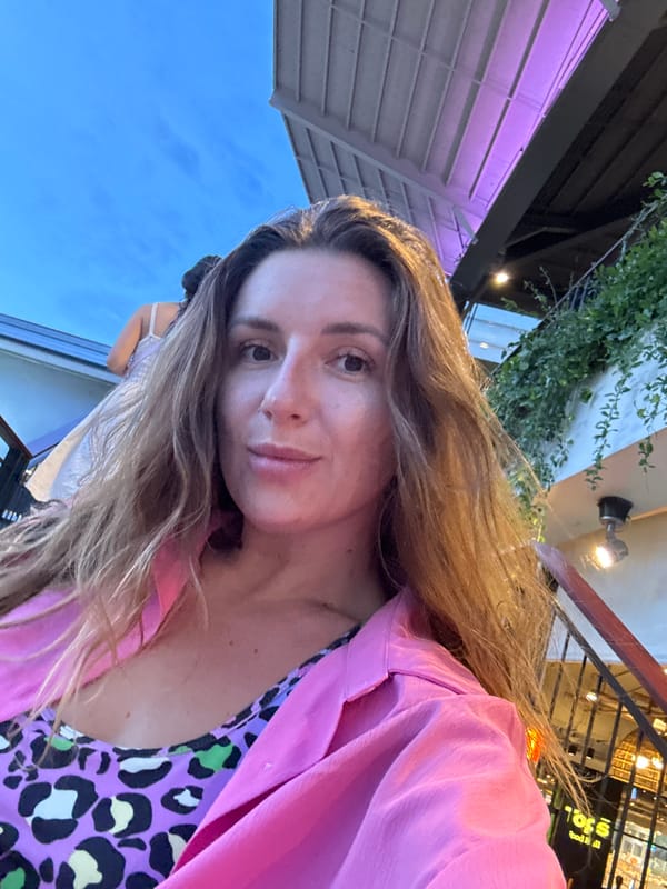 Exploring a tropical night market and shopping district at dusk