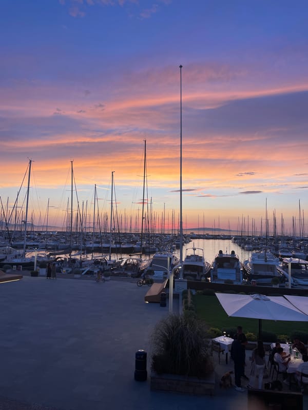 Punta Ala marina at golden hour, masts and color everywhere