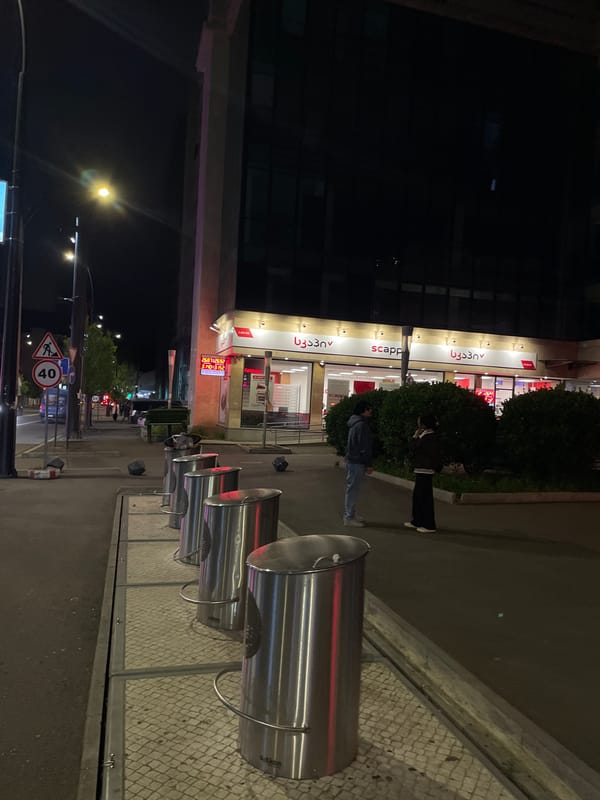 Nighttime urban documentation captures quiet Tbilisi streets and infrastructure